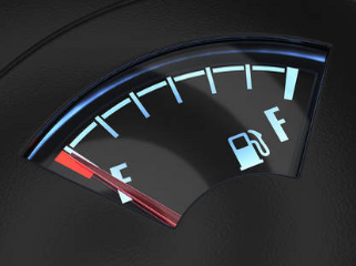 empty fuel gauge on car with arrow on E